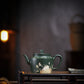 Lotus Rhyme Fanggu Teapot in Green Zisha Clay, 230 ml