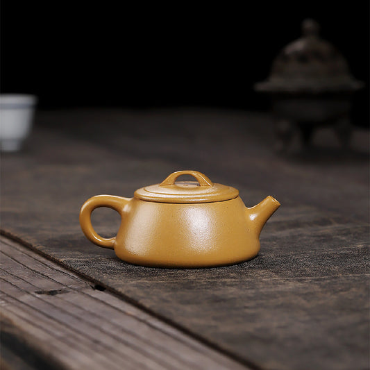 Flat-covered stone scoop gold section mud purple clay pot